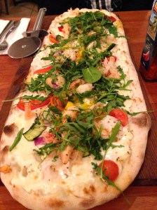 PRAWN & LOBSTER: King prawns and lobster, béchamel sauce, grilled courgettes, cherry tomates, roasted peppers, red onion, rocket and mozzarella.