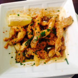 Piernas de rana con ajo, perejil y salsa de manteca